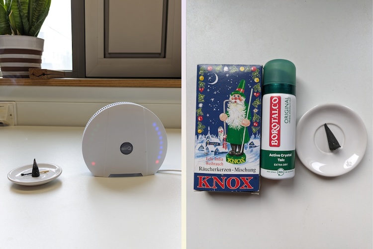 Luftmessgerät air-Q mit rot leuchtender LED-Anzeige neben Räucherkerzen und Duftsprayy